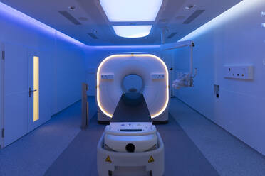 View of a scanner room bathed in blue light - CAVF92850
