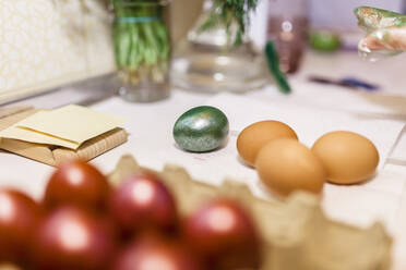 Easter eggs on table at home - MRRF00879