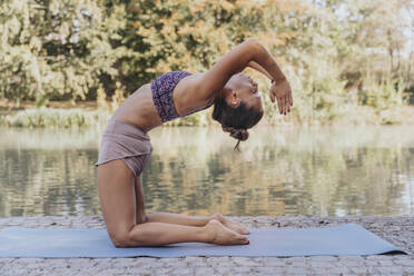 A Woman Does Yoga On The Terrace In A Geo Dome Glamping Tent. Stock Photo,  Picture and Royalty Free Image. Image 190093431.