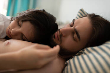 Portrait Of A Sleeping Couple together in their house. - CAVF93273