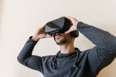 Man wearing virtual reality simulator - EGAF01743