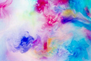 Full frame of colorful liquids mixing together - GEMF04658