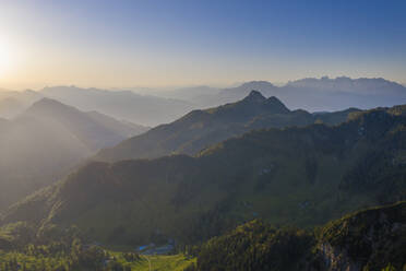 Sun rising over foggy valley in Mangfall Mountains - SIEF10099