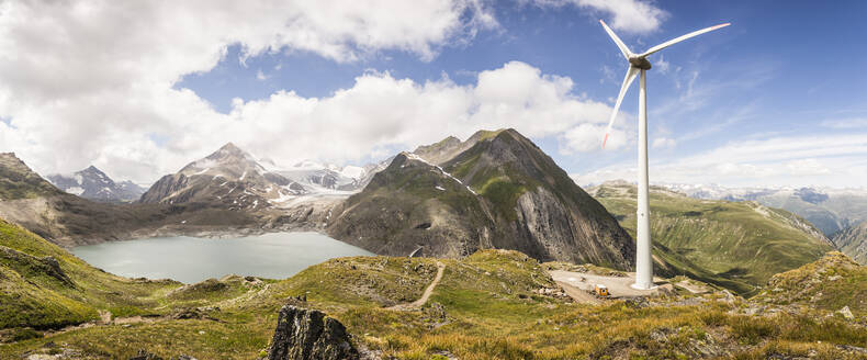 Wind turbine by Griessee lake with Gries glacier in background at Nufenen Pass, Valais, Switzerland - MSUF00506