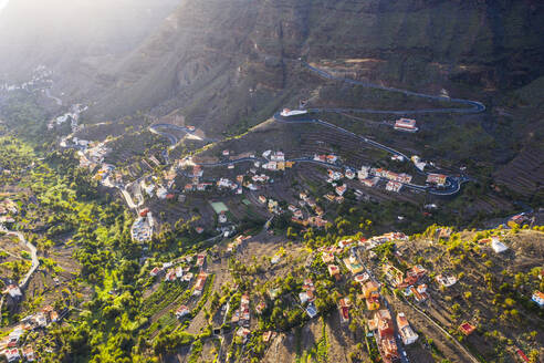 Spain, Valle Gran Rey, Drone view of village and winding road in valley of La Gomera - SIEF10112