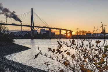 Germany, Hamburg, Koehlbrand bridge in autumn at dusk - KEBF01780