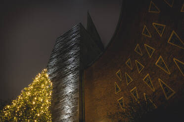 Germany, Hamburg, Saint Nikolai Church with Christmas treein Harvestehude at night  - KEBF01794