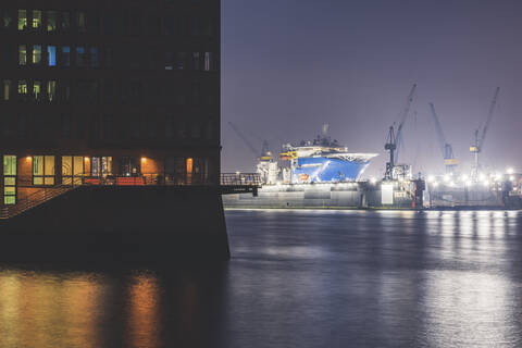 Germany, Hamburg, Harbor at night stock photo