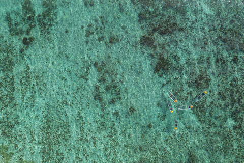 Drone view of turquoise surface of Indian Ocean in summer stock photo