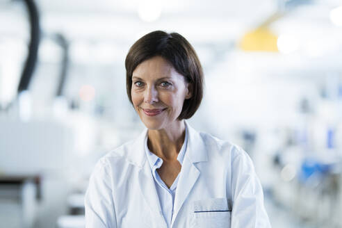Smiling female scientist at laboratory - JOSEF03713