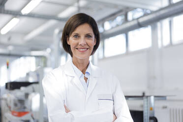 Smiling female scientist at laboratory - JOSEF03870