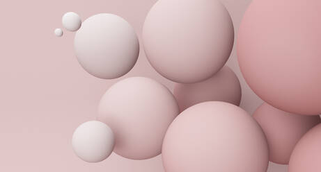 Spheres against pink background  - JPSF00061