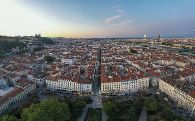 France, Auvergne-Rhone-Alpes, Lyon, Aerial view of residential city district at dusk - HAMF00856