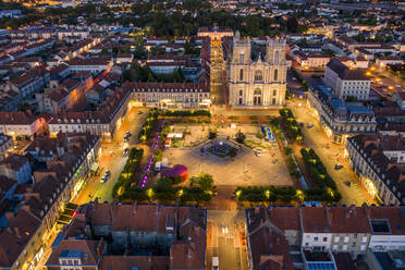 France, Marne, Vitry-le-Francois, Aerial view of illuminated square in front of Collegiale Notre-Dame De Vitry-Le-Francois church at dusk - HAMF00864