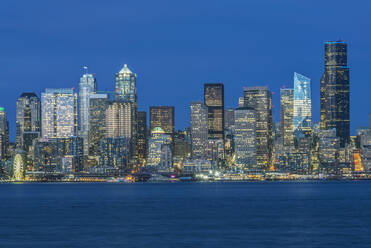 Seattle skyline, from Puget Sound, downtown buildings at night. - MINF16043