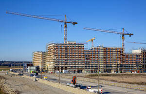 Germany, Bavaria, Munich, Large construction site with cranes - MAMF01666