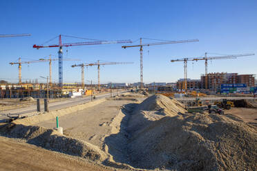 Germany, Bavaria, Munich, Large construction site with cranes - MAMF01667