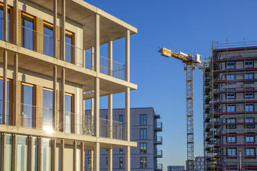 Germany, Bavaria, Munich, Large construction site with cranes - MAMF01677