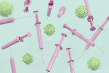 Digitally generated image of pink syringes and COVID-19 virus - ECF02031