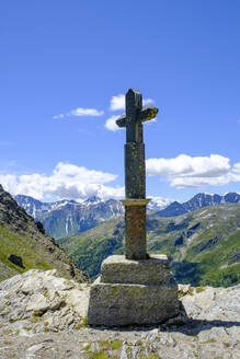 Italy, Aosta Valley, Summit cross at Great St Bernard Pass - LBF03482