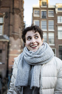 The Netherlands, Amsterdam, Girl with short hair in the city  - AXHF00217