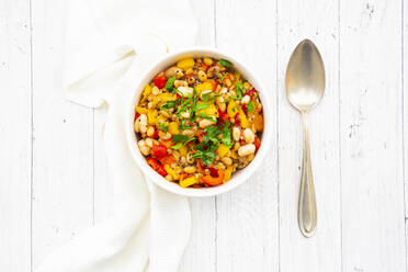 Bowl of bean stew with bell peppers, quinoa and parsley - LVF09132