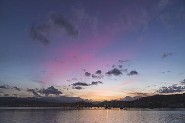 Spain, Cantabria, San Vicente de la Barquera, Sea at dusk - JAQF00415