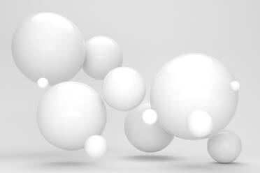 Three dimensional render of white floating spheres - JPSF00103