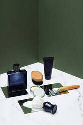 Male grooming products on marble table - BOYF01974