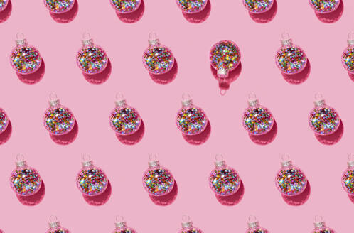Bright balls for Christmas tree pattern on pink background - GEMF04727