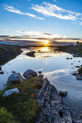 Norway, Vega Archipelago, Sunset over Unesco world heritage site - RUNF04261