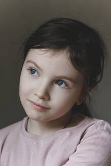 Innocent girl with blue eyes looking away - EYAF01577