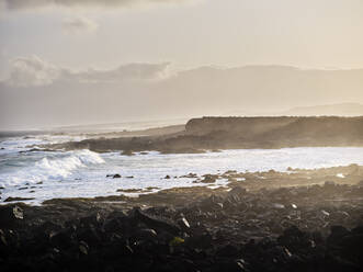 Spain, Canary Islands, Rocky coastline of Boca de Abajo beach at dawn - CVF01686