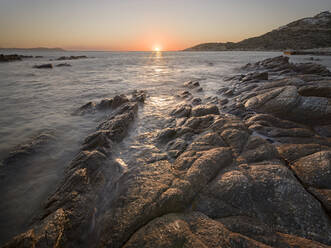Sunset on the sea and rocks, Antiparos Island, Cyclades, Greek Islands, Greece, Europe - RHPLF19460