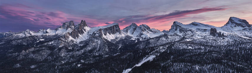 Panoramic at sunset of Dolomites of Cortina d'Ampezzo covered by snow, Croda da Lago, Pelmo, Five Towers (Cinque Torri), Trentino-Alto Adige, Italy, Europe - RHPLF19496