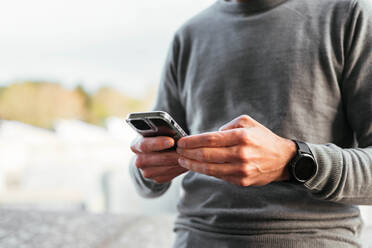 Close up of a man using smartphone - CAVF93769