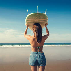 Surfer girl on the beach - CAVF93905