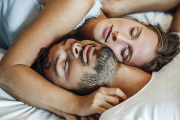 Young couple sleeping together at home - JOSEF04112