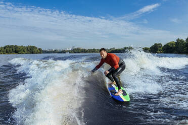 Man wakesurfing in Moskva river - KNTF06229