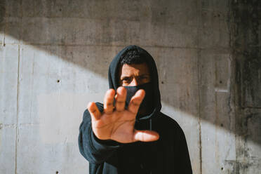 Person in Black Hoodie with Mask · Free Stock Photo