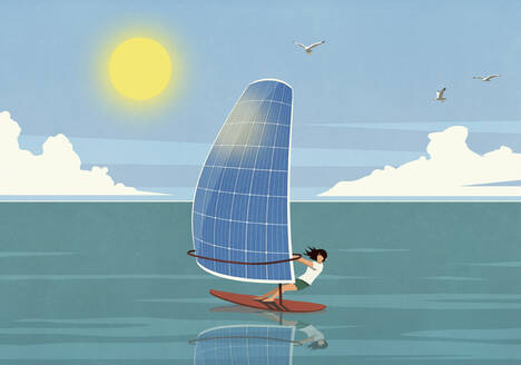Woman windsurfing with solar panel sail on sunny ocean - FSIF05675