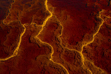 Majestic view of orange rock in river with fast flow in long exposure in Minas de Rio tinto - ADSF23491