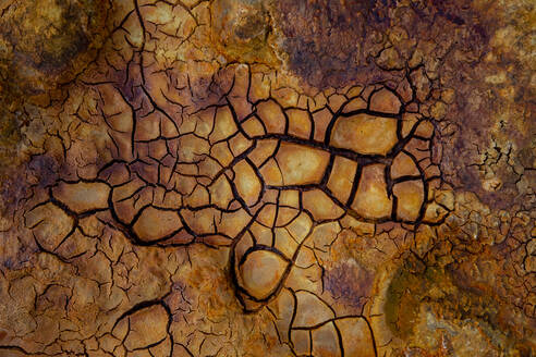 Top view of textured background of dry cracked earth in Minas de Rio tinto - ADSF23493