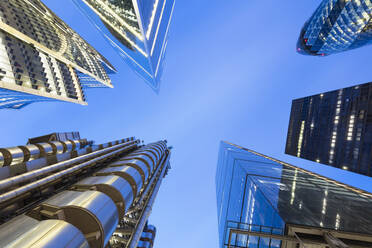 UK, England, London, Blue sky over tall skyscrapers at dusk - AHF00370