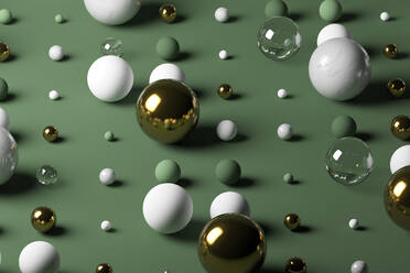 Gold, Glas, Marmorkugeln vor pastellgrünem Hintergrund - JPSF00144