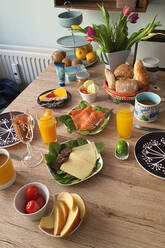 Easter breakfast arranged on dining table at home - NGF00740