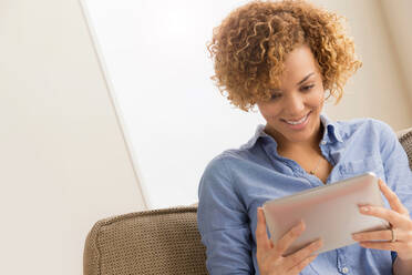 Young woman with electronic book - ISF24556