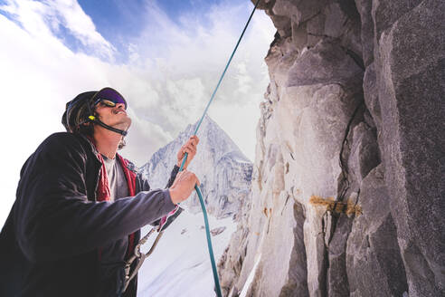 Man rock climbing in Bugaboo Provincial Park, Alberta, Canada - ISF24566