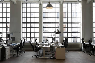 Interior of creative office with desks and chair - MASF23350