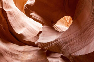 Water eroded Navajo Sandstone forms a slot canyon in Upper Antelope Canyon, Navajo Land, Arizona, United States of America, North America - RHPLF19759